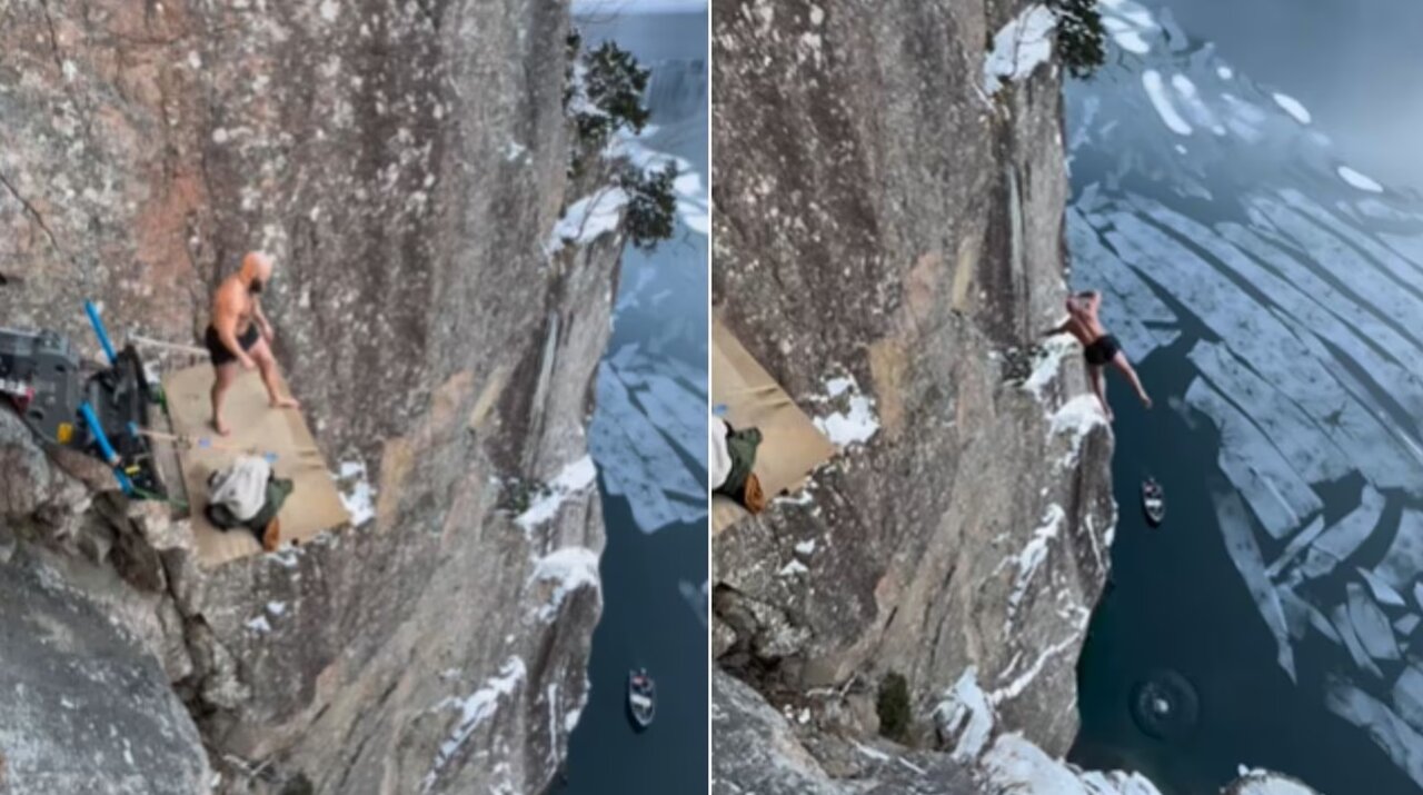 «شیرجه مرگبار» از ارتفاع ۴۰ متری درون آب یخ/ عکس